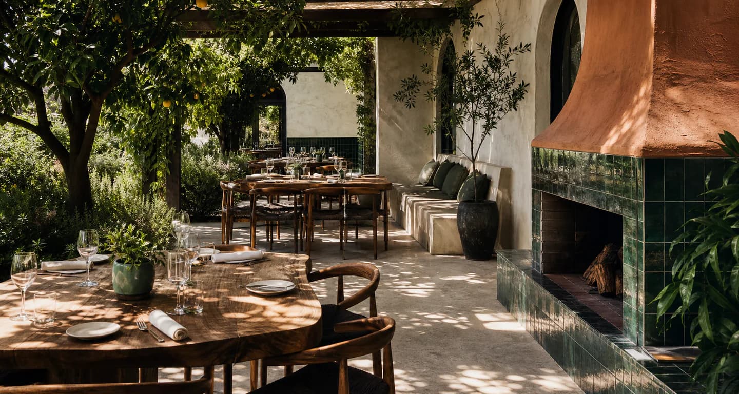 Garden restaurant with forest green tiles and a terracotta hearth